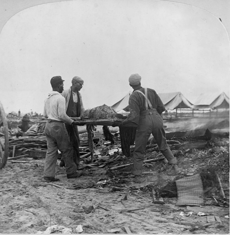 carrying dead to cremation after galveston flood